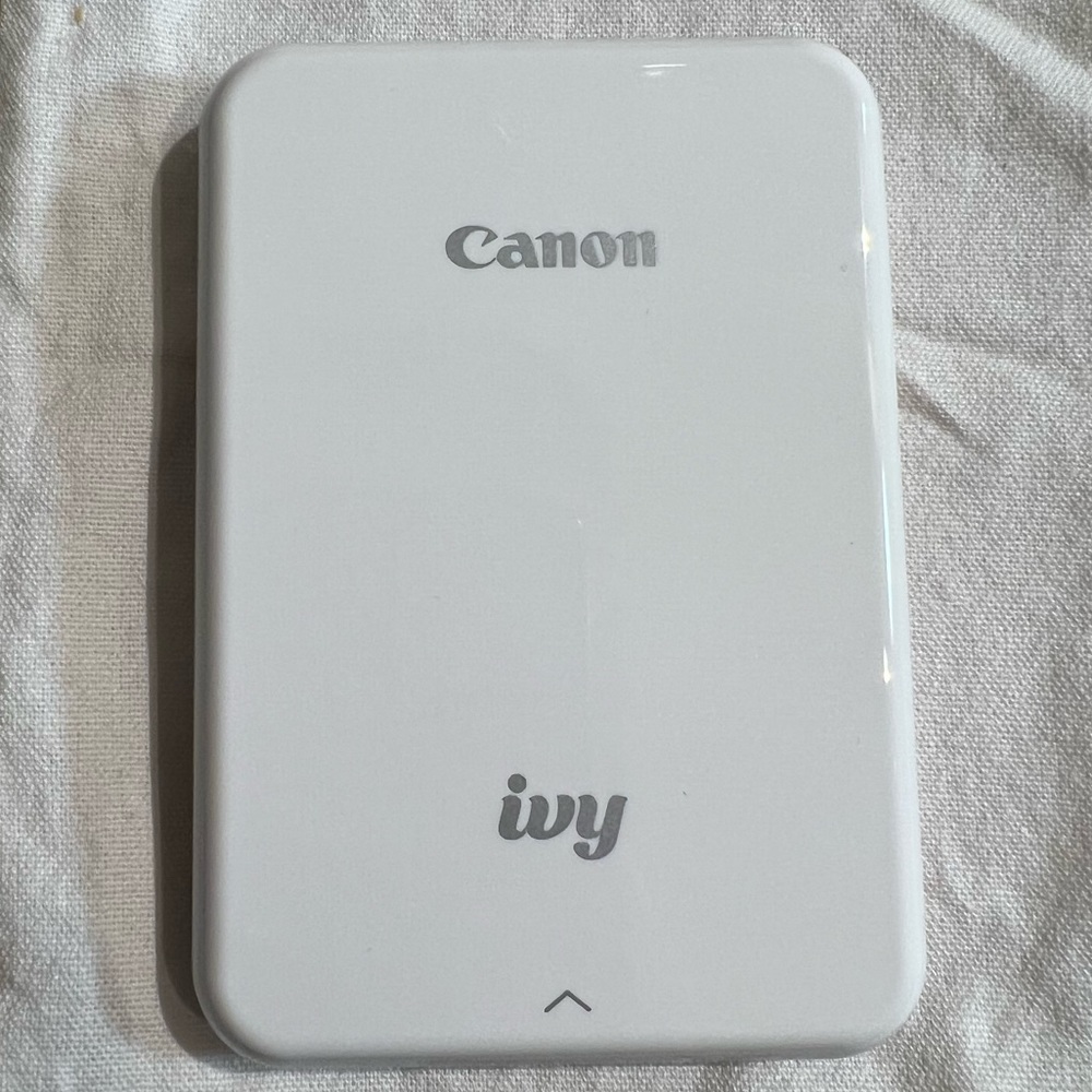 Canon Ivy photo printer with two packs of circle film.